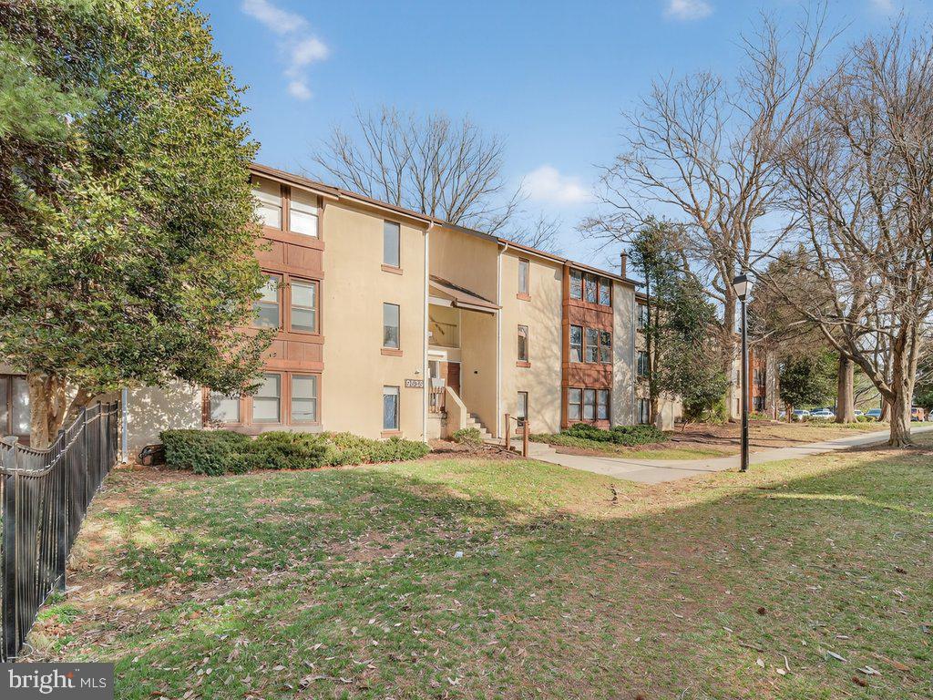 9635 White Acre Road, Unit B2 Columbia, MD 21045 - Photo 2 of 31 a view of a large house with a large trees
