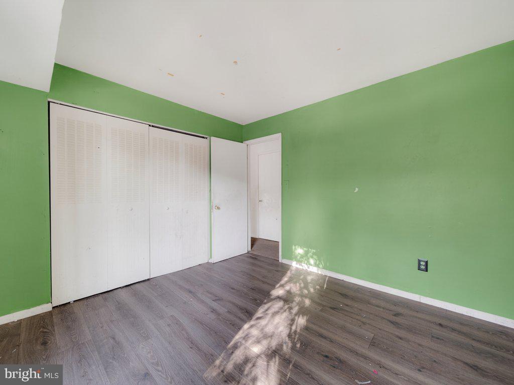 9635 White Acre Road, Unit B2 Columbia, MD 21045 - Photo 28 of 31 a view of room with wooden floor