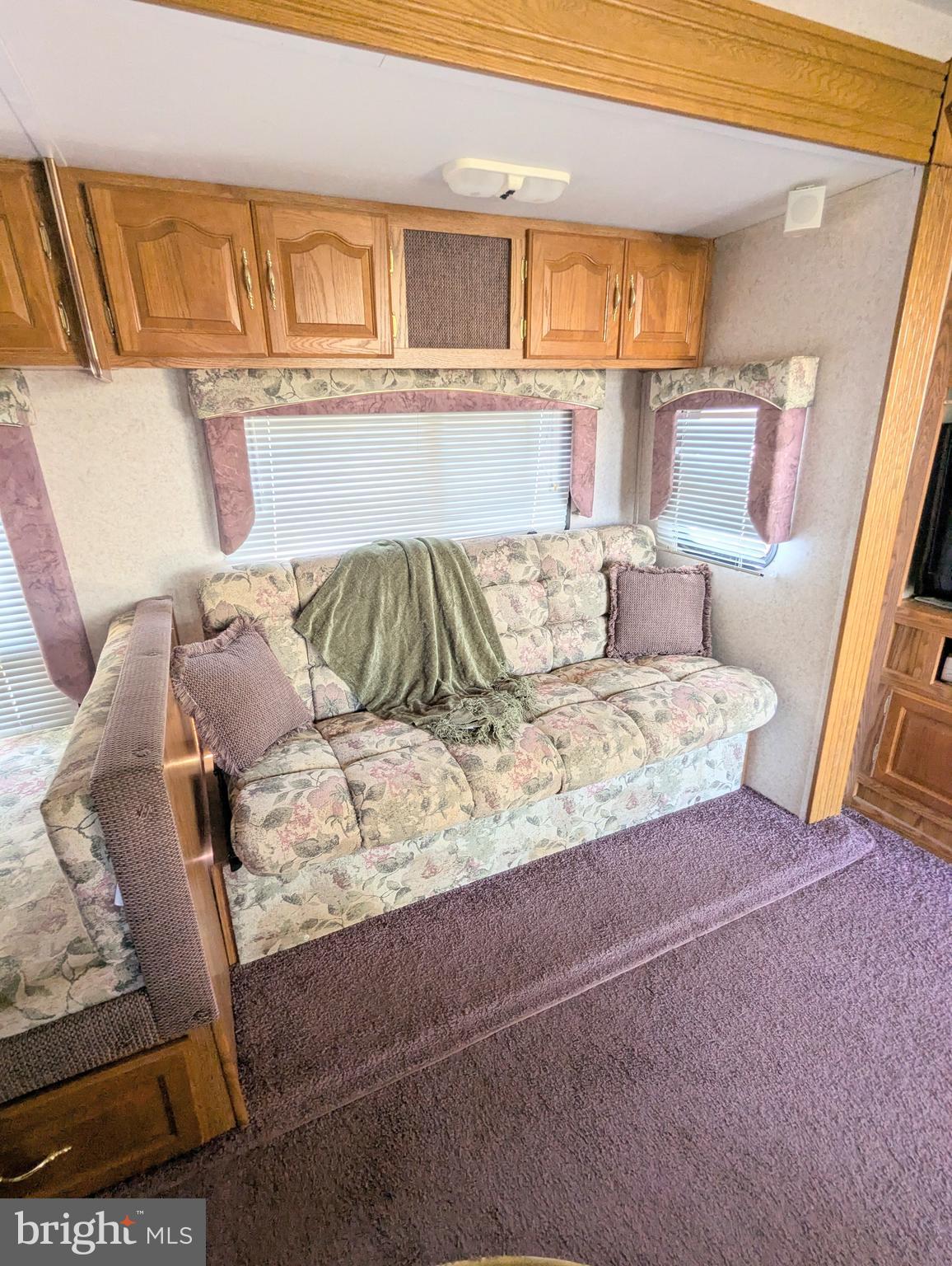 8 Avalanche Avenue Falling Waters, WV 25419 - Photo 3 of 13 a living room with furniture and a couch