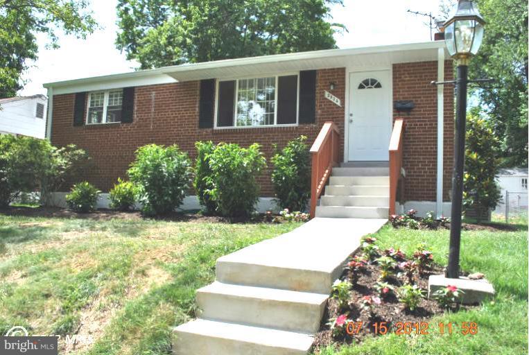 2904 Harris Avenue Silver Spring, MD 20902 - Photo 1 of 17 a front view of a house with garden