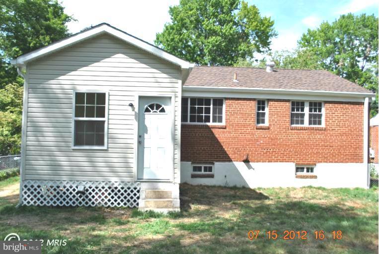 2904 Harris Avenue Silver Spring, MD 20902 - Photo 15 of 17 a view of a brick house with a yard