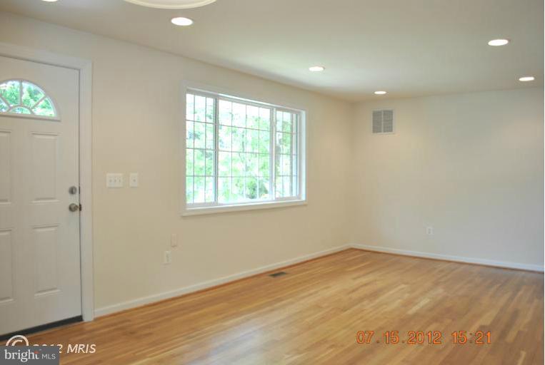 2904 Harris Avenue Silver Spring, MD 20902 - Photo 7 of 17 a view of empty room with wooden floor and fan