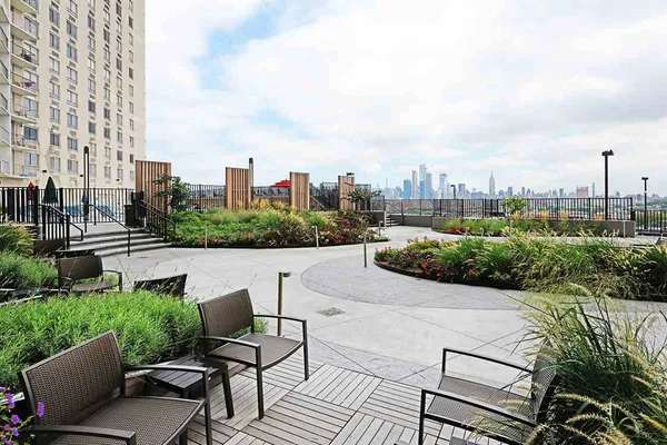 a view of a terrace with sitting area