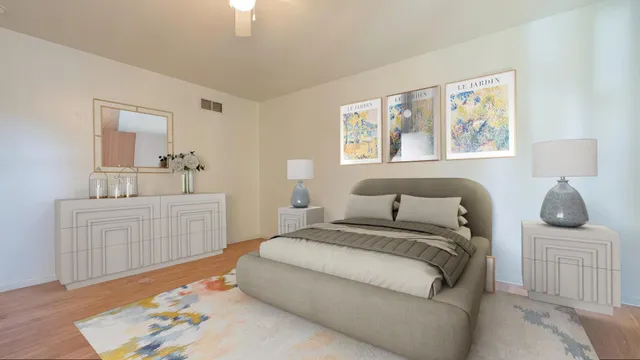 a bedroom with a bed and furniture