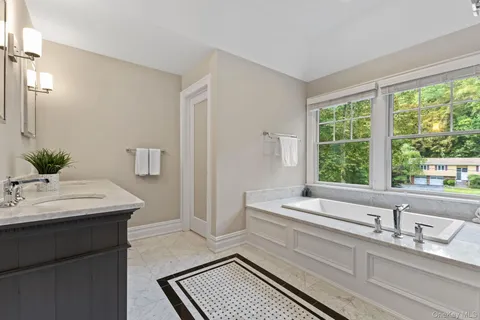 a bathroom with a sink and a bathtub