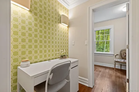 a room with a table and a window