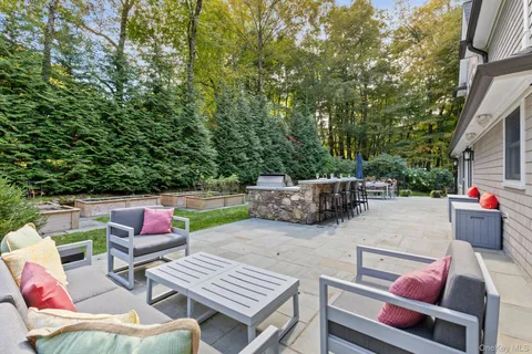 an outdoor space with patio furniture