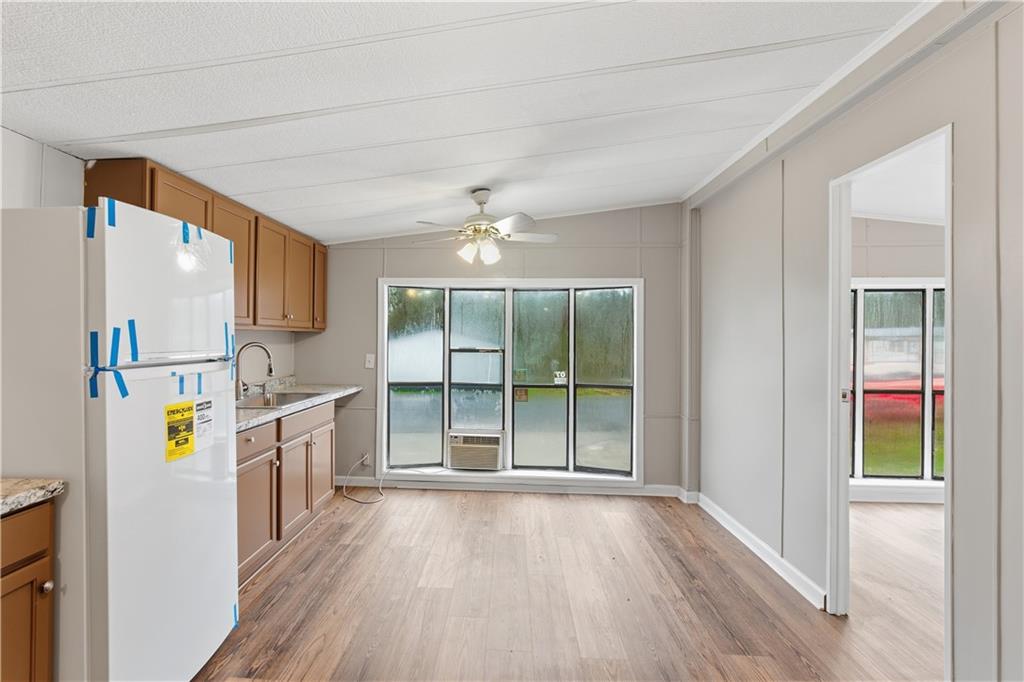 50 Tency Lane Northeast Rome, GA 30165 - Photo 11 of 28 a view of empty room with wooden floor and fan