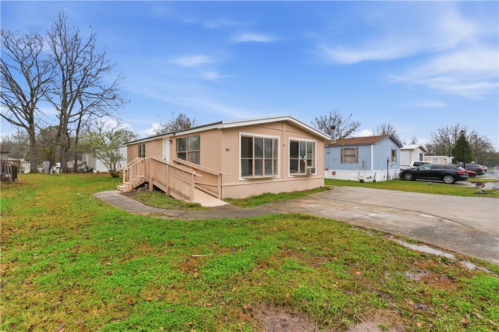 50 Tency Lane Northeast Rome, GA 30165 - Photo 22 of 28 a view of a house with a yard