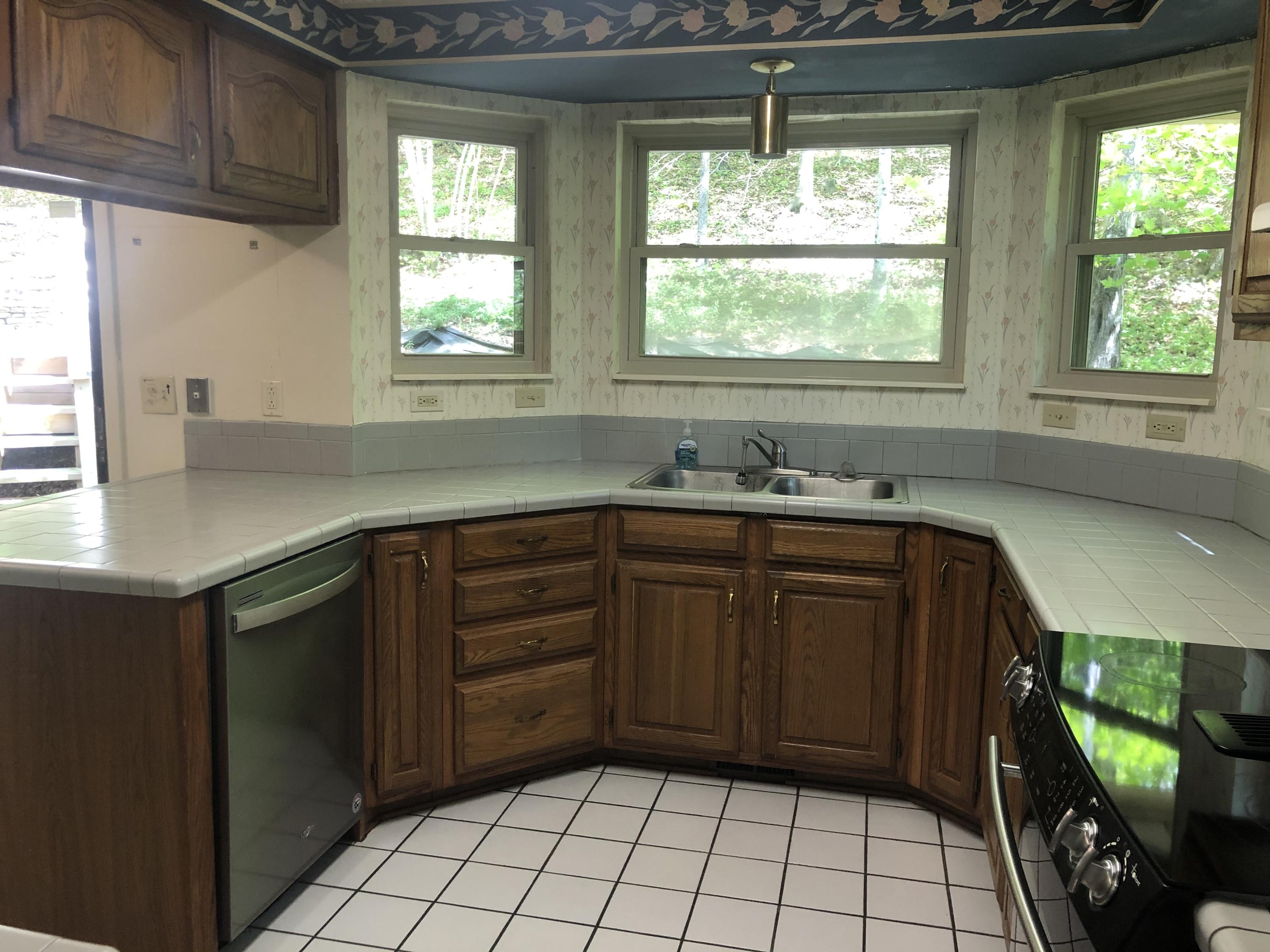 104 Greywood Place Oak Ridge, TN 37830 - Photo 3 of 18 Kitchen With Newer Dishwasher and Range
