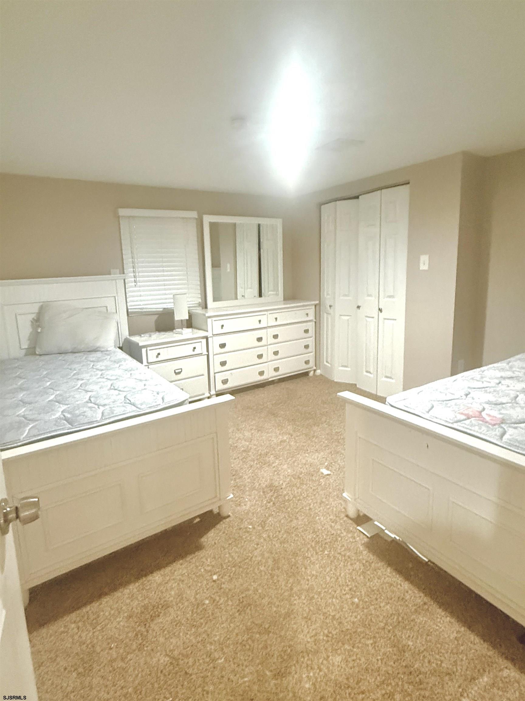 752 7th Street, Unit B Somers Point, NJ 08244 - Photo 8 of 10 a living room with granite countertop furniture and fireplace