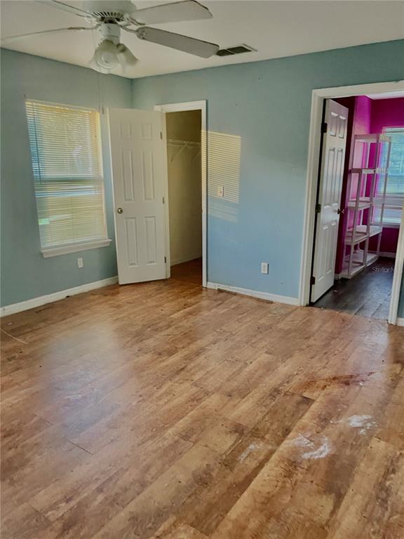 2 Redwood Track Run Ocala, FL 34472 - Photo 12 of 13 an empty room with fan and windows