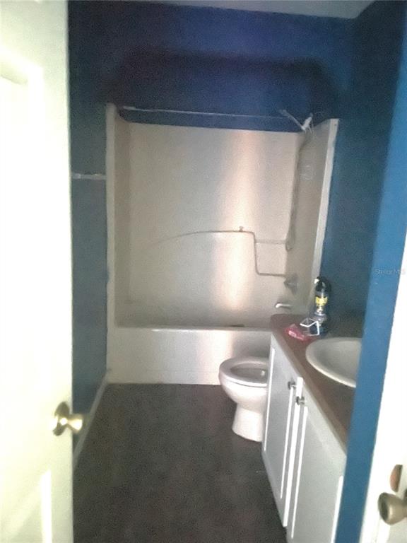 2 Redwood Track Run Ocala, FL 34472 - Photo 7 of 13 a bathroom with a sink and a toilet