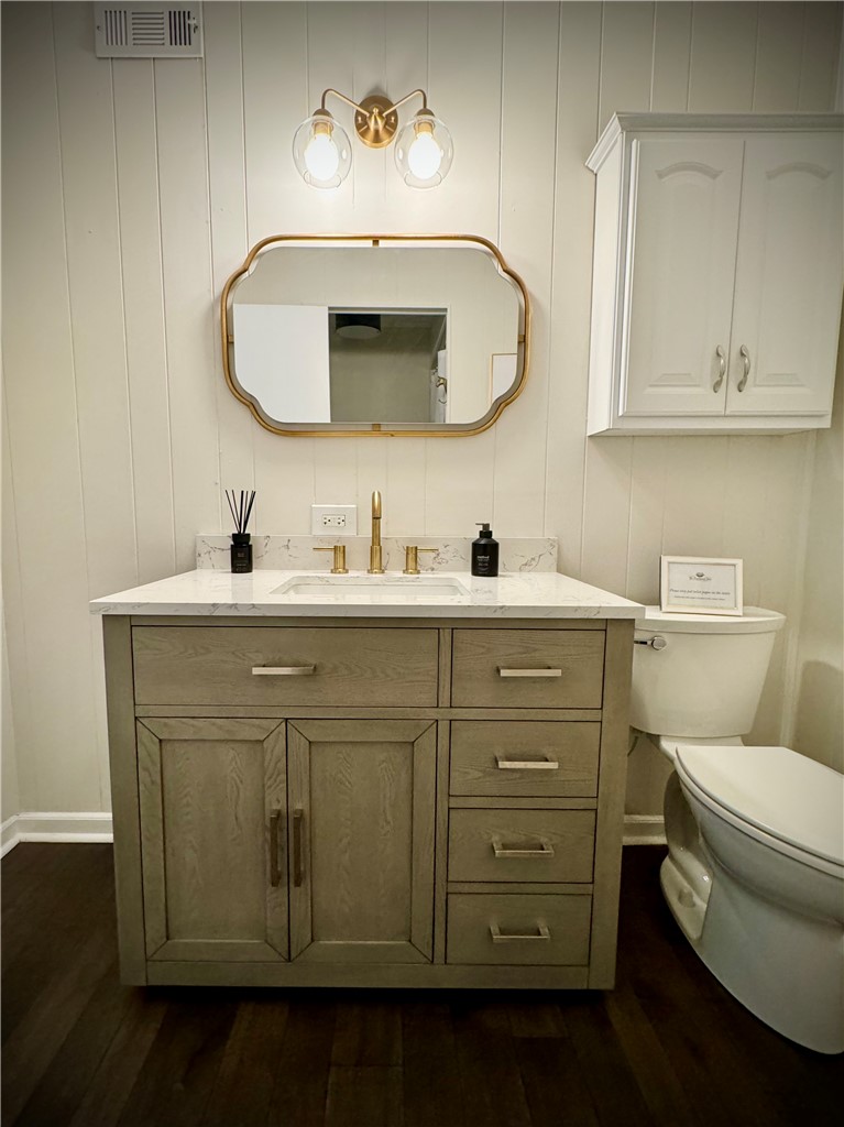 4115 Liberty Highway Anderson, SC 29621 - Photo 19 of 34 Bath Vanity and Toilet Area Staged