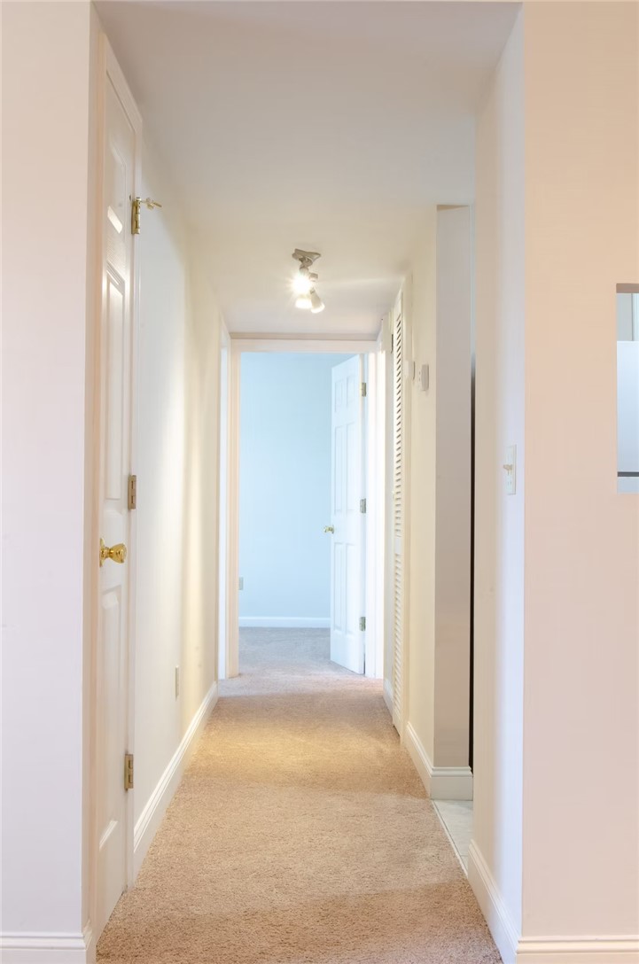 4115 Liberty Highway Anderson, SC 29621 - Photo 23 of 34 Typical Upstairs Carpeted Unit Hall