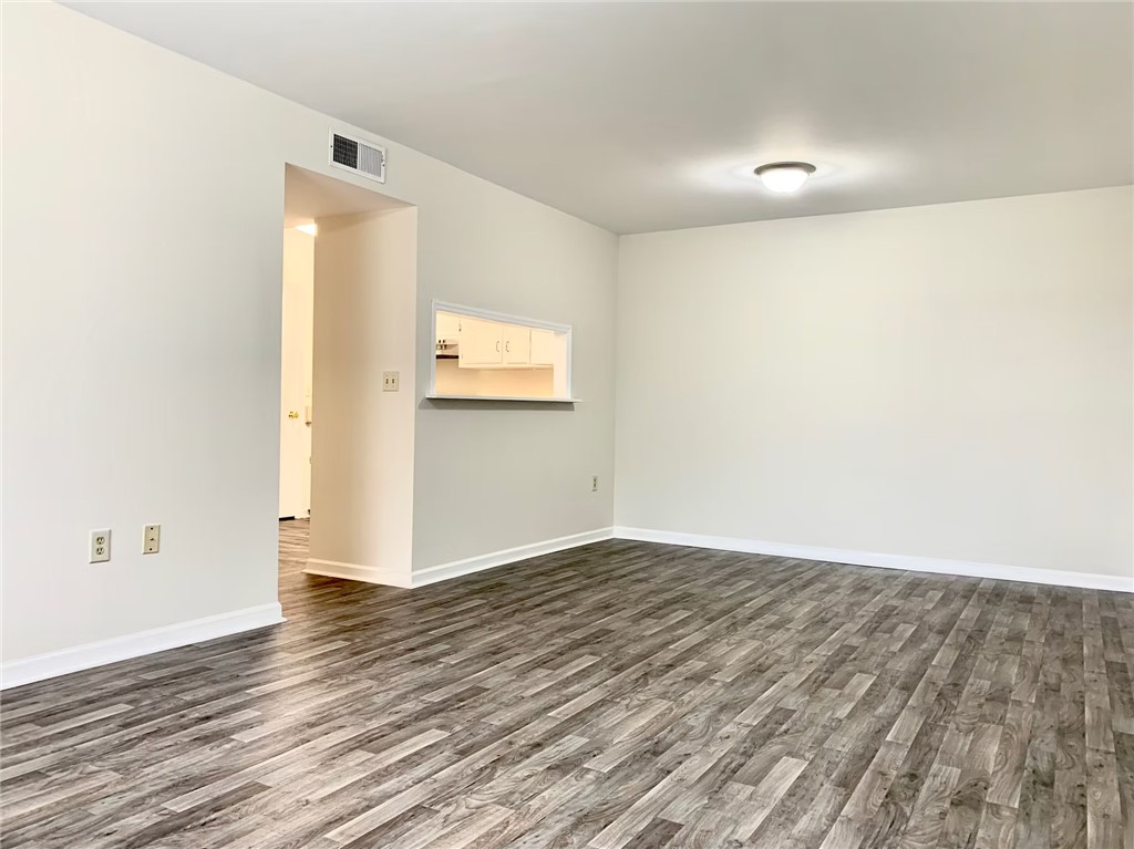 4115 Liberty Highway Anderson, SC 29621 - Photo 29 of 34 Typical Downstairs Vinyl Floor Covering Unit Great Room