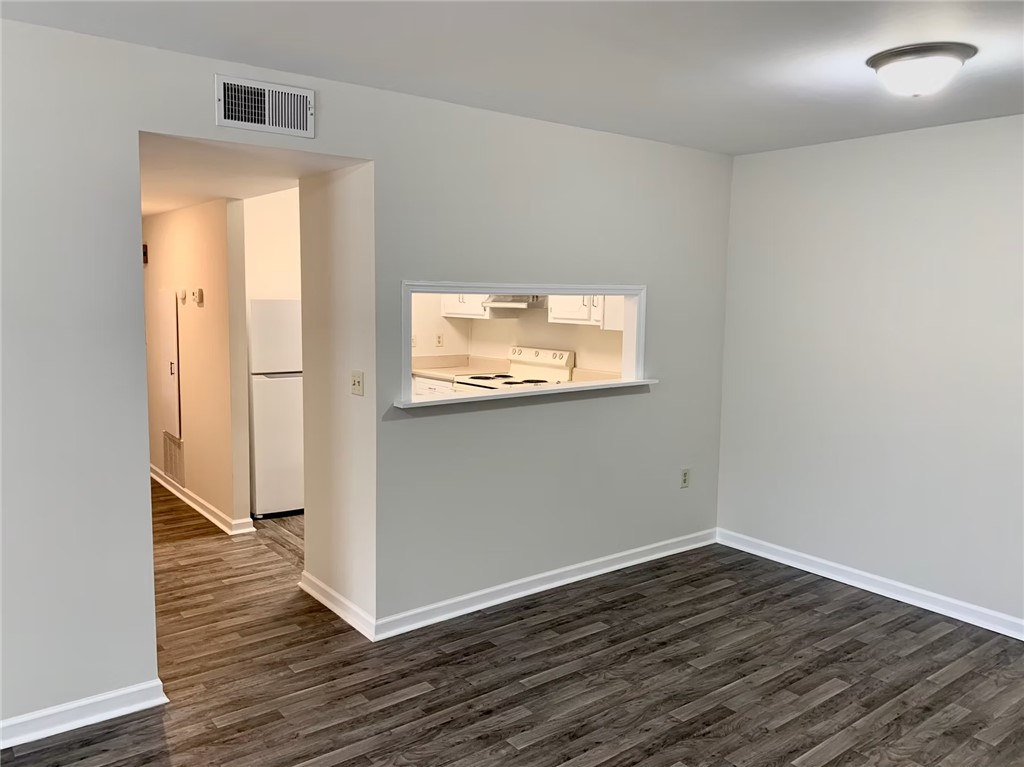 4115 Liberty Highway Anderson, SC 29621 - Photo 33 of 34 Typical Downstairs Vinyl Floor Covering Unit Great Room