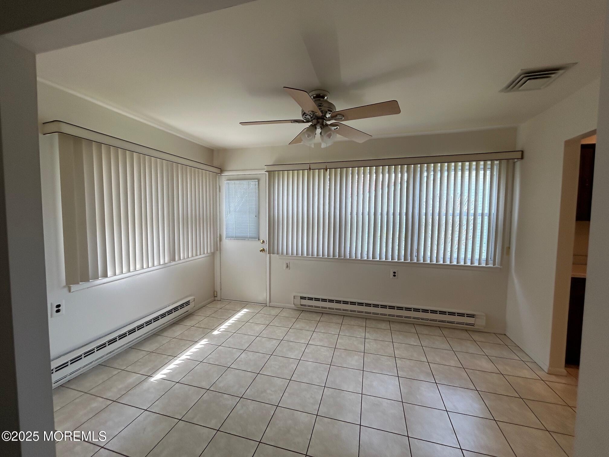 60 Central Boulevard Brick, NJ 08724 - Photo 4 of 22 a view of an empty room with a window