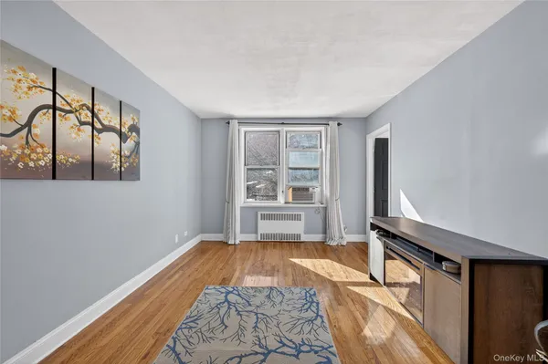 a view of an empty room and window