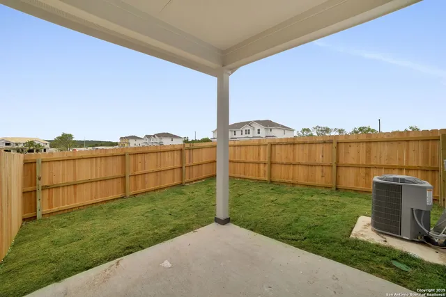a view of a terrace with a garden