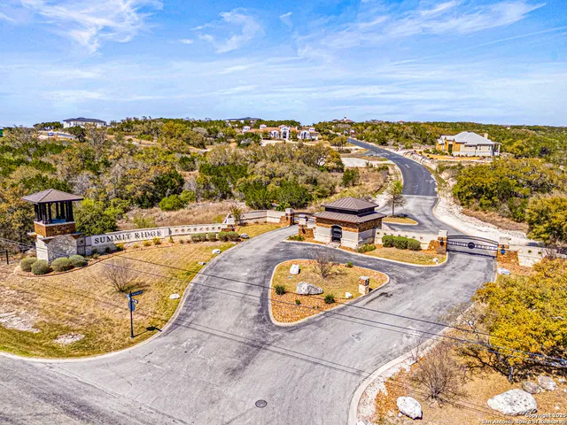 view of a swimming pool from a balcony