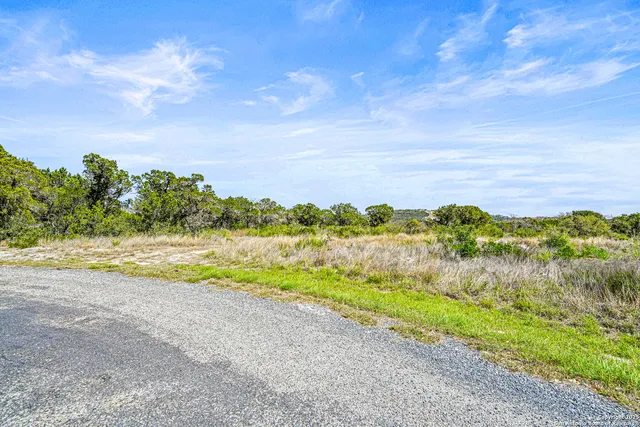 a view of a swimming pool with an ocean view