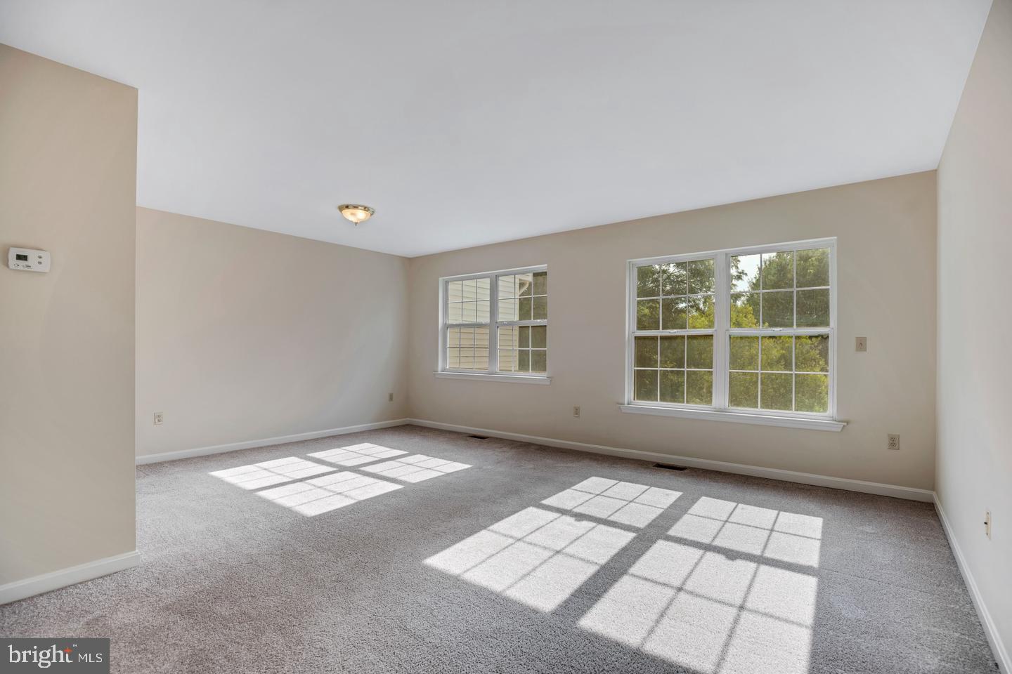 8549 E Street Chesapeake Beach, MD 20732 - Photo 4 of 10 a view of empty room with windows