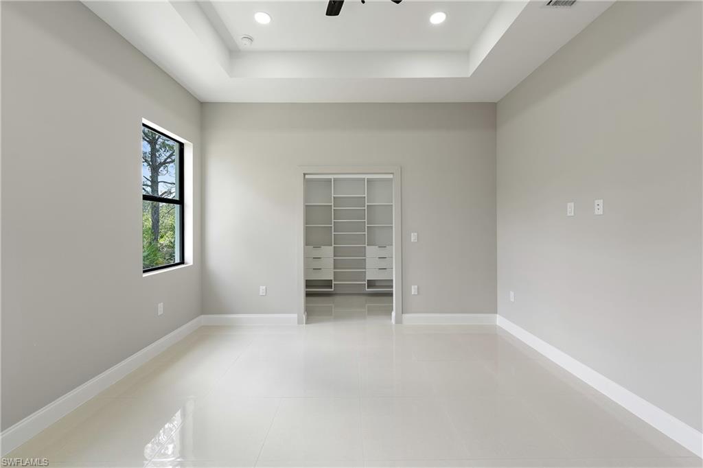 2903 37th Street West Lehigh Acres, FL 33971 - Photo 10 of 23 an empty room with windows