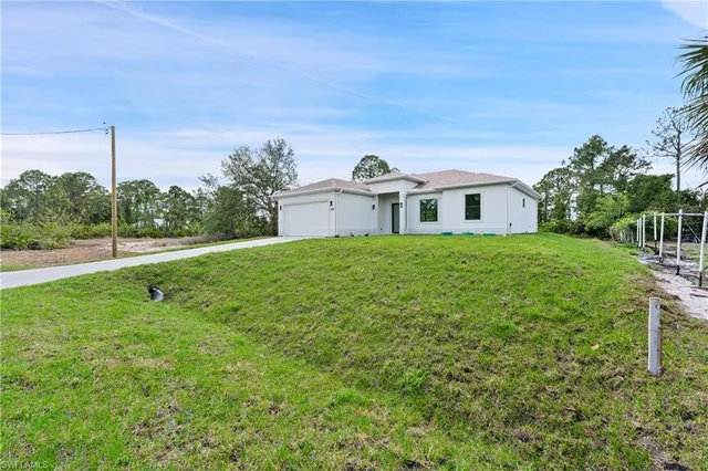 a house view with a garden space