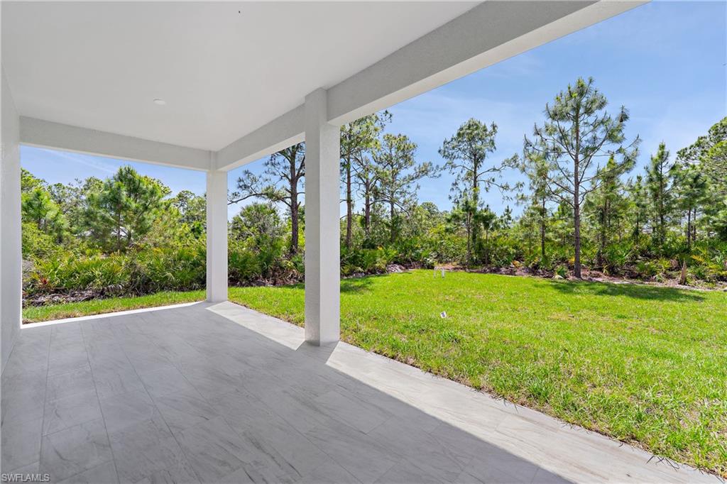 2903 37th Street West Lehigh Acres, FL 33971 - Photo 21 of 23 a view of a garden with an outdoor space