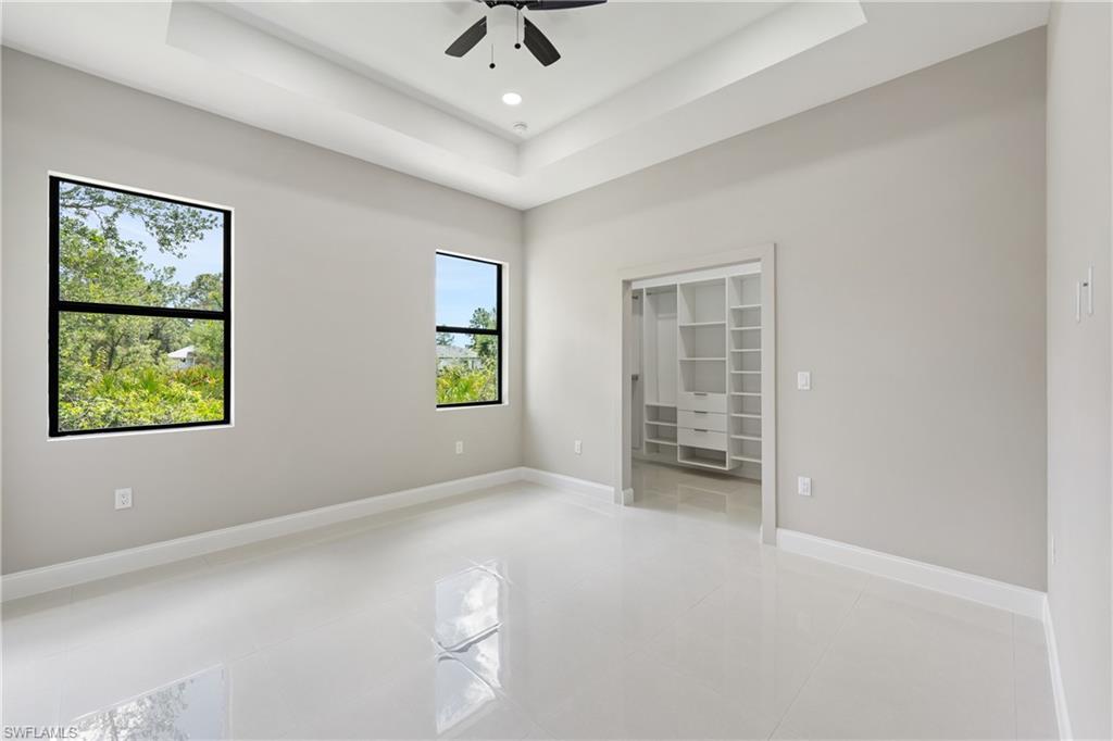 2903 37th Street West Lehigh Acres, FL 33971 - Photo 9 of 23 an empty room with windows and closet