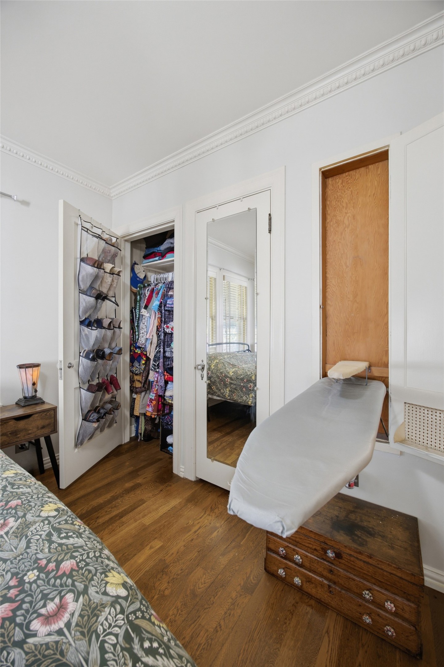 1030 East 44th Street Austin, TX 78751 - Photo 15 of 29 a bedroom with a bed and a desk