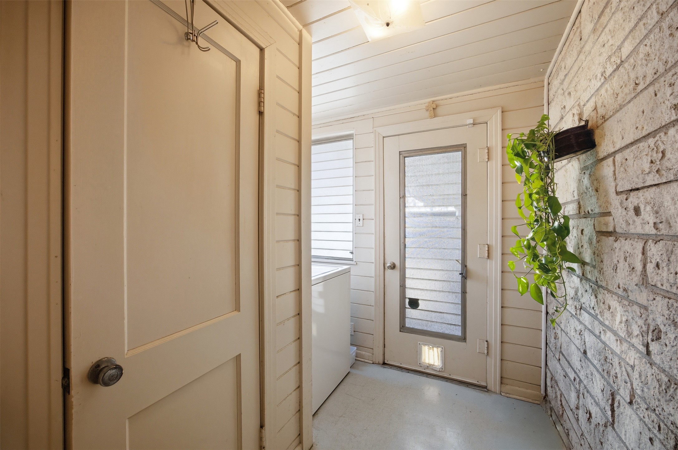 1030 East 44th Street Austin, TX 78751 - Photo 17 of 29 a view of a hallway with wooden shelves