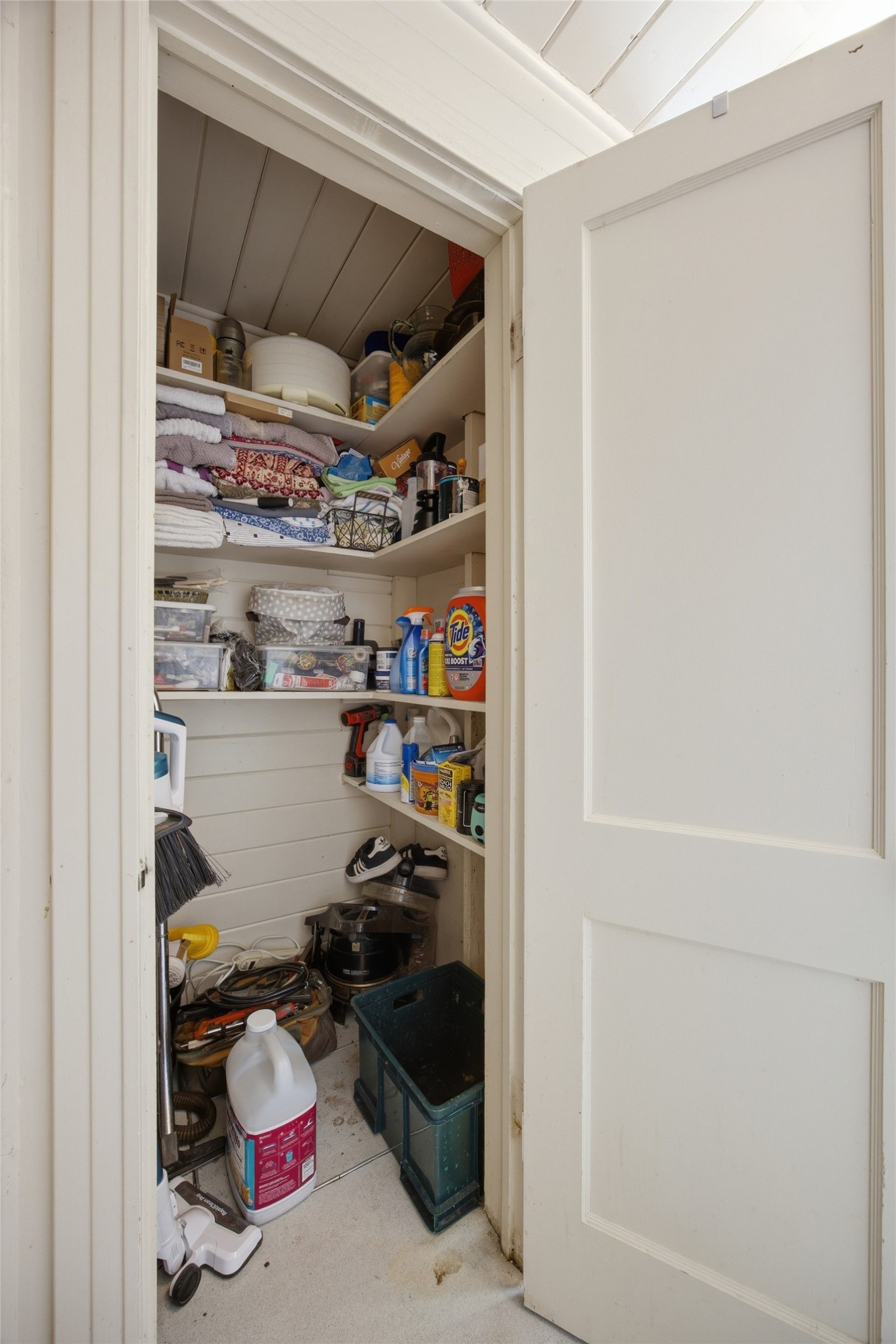 1030 East 44th Street Austin, TX 78751 - Photo 18 of 29 a view of walk in closet with clothes and shoes