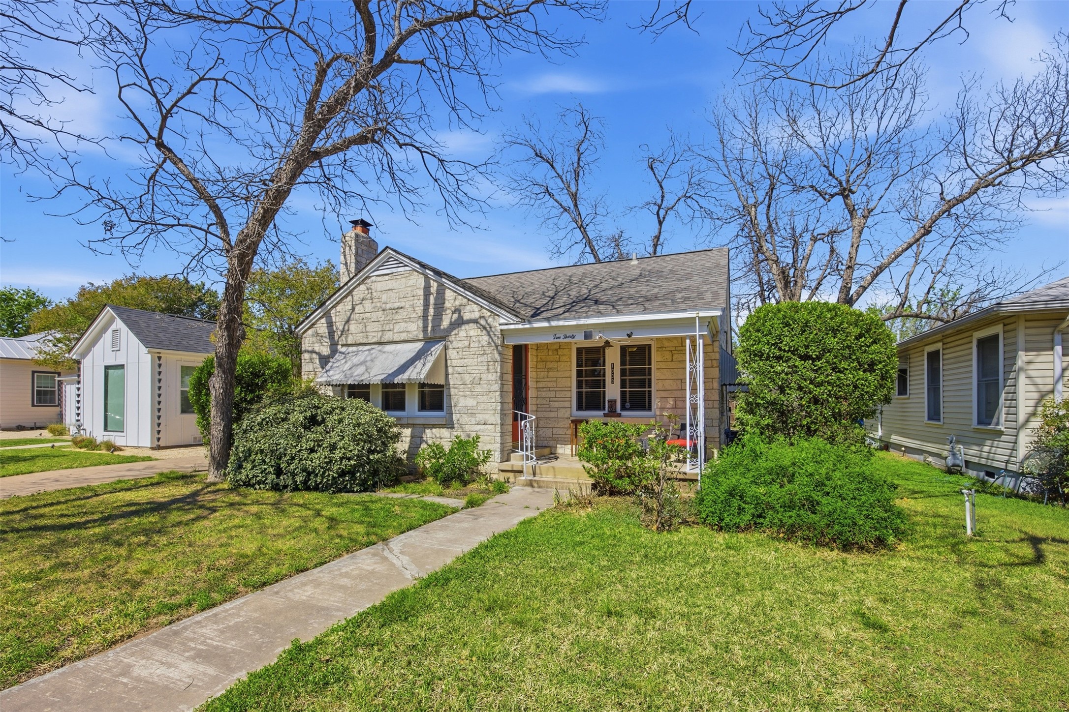 1030 East 44th Street Austin, TX 78751 - Photo 2 of 29 front view of house with a yard