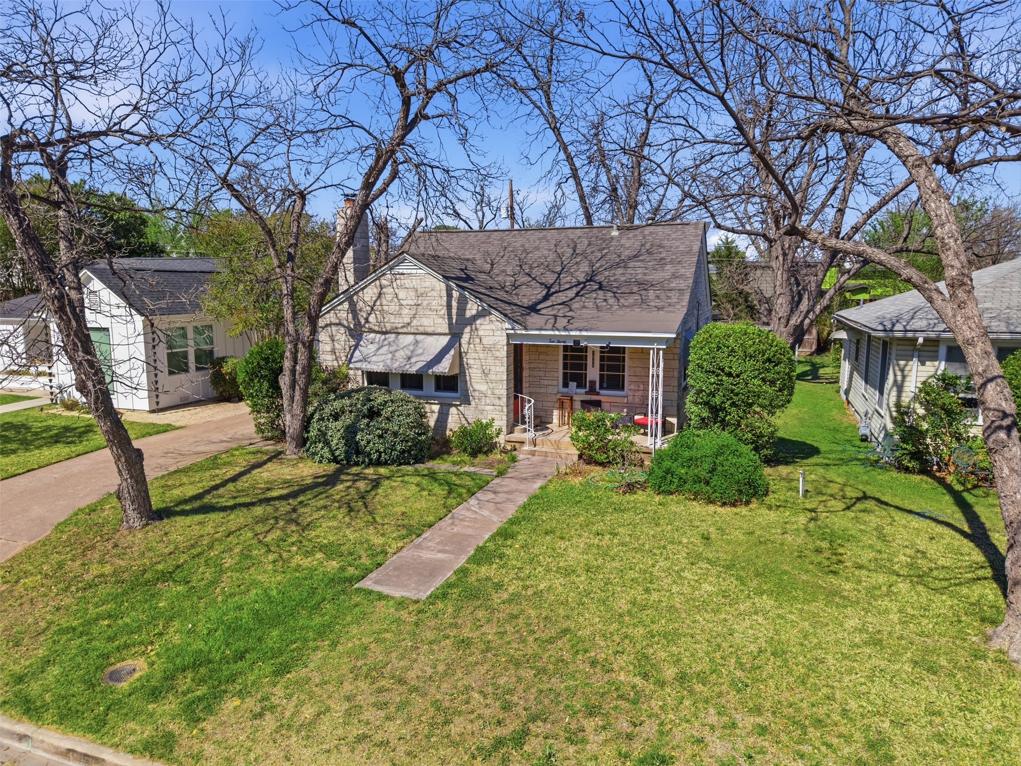 1030 East 44th Street Austin, TX 78751 - Photo 26 of 29 front view of a house with a yard