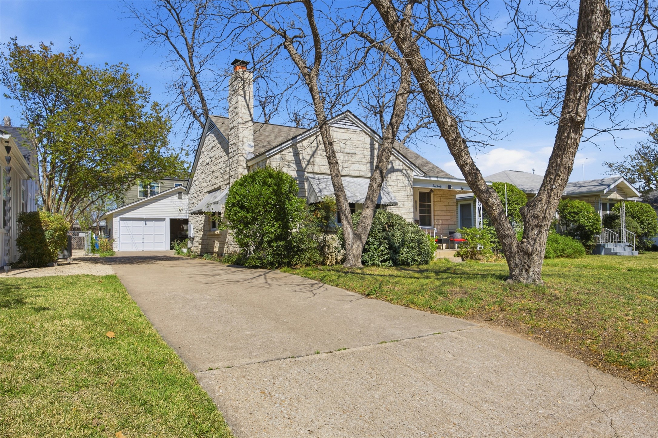 1030 East 44th Street Austin, TX 78751 - Photo 3 of 29 a view of a house with a yard