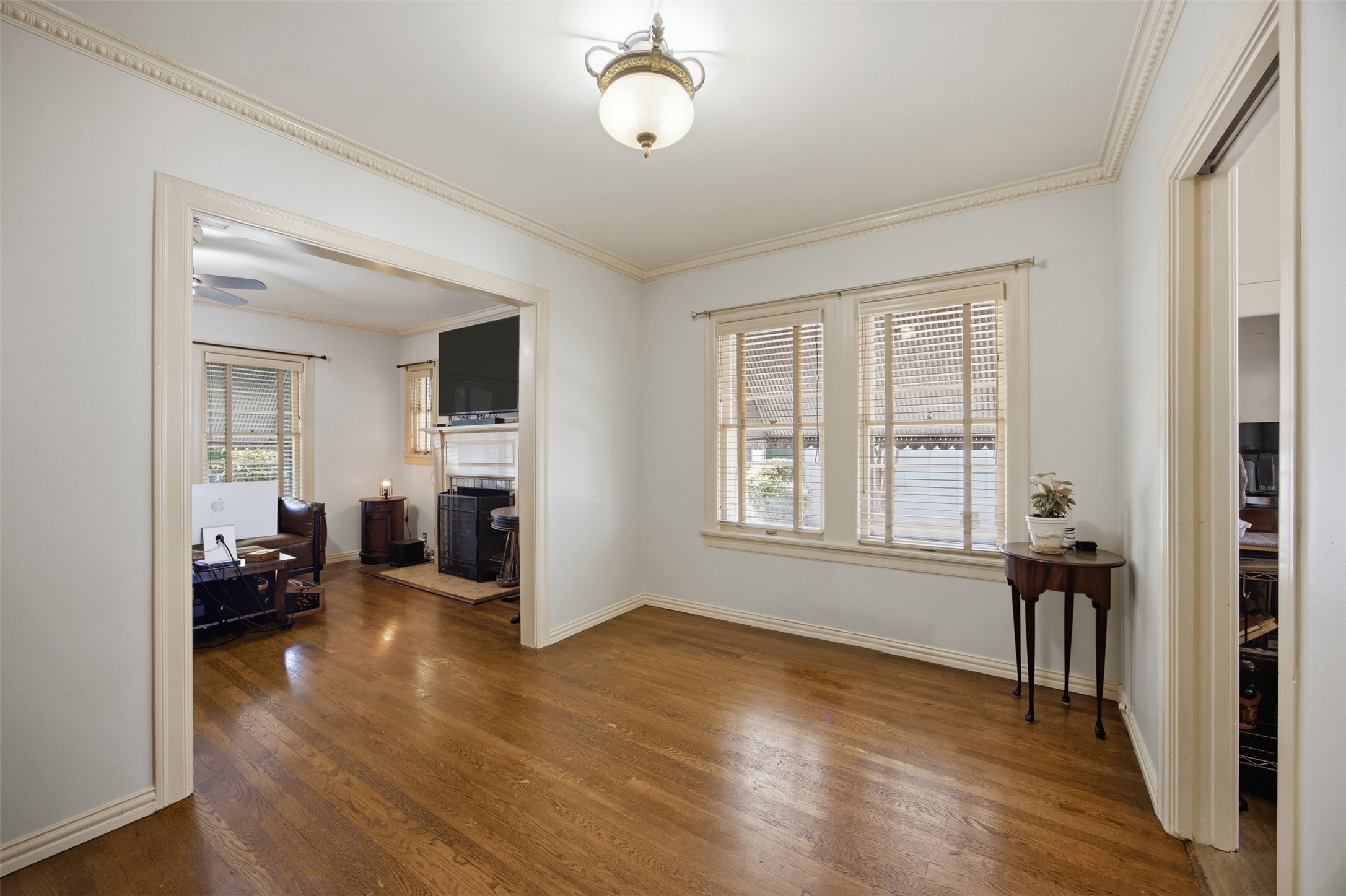 1030 East 44th Street Austin, TX 78751 - Photo 7 of 29 wooden floor in an empty room with a window and a livingroom