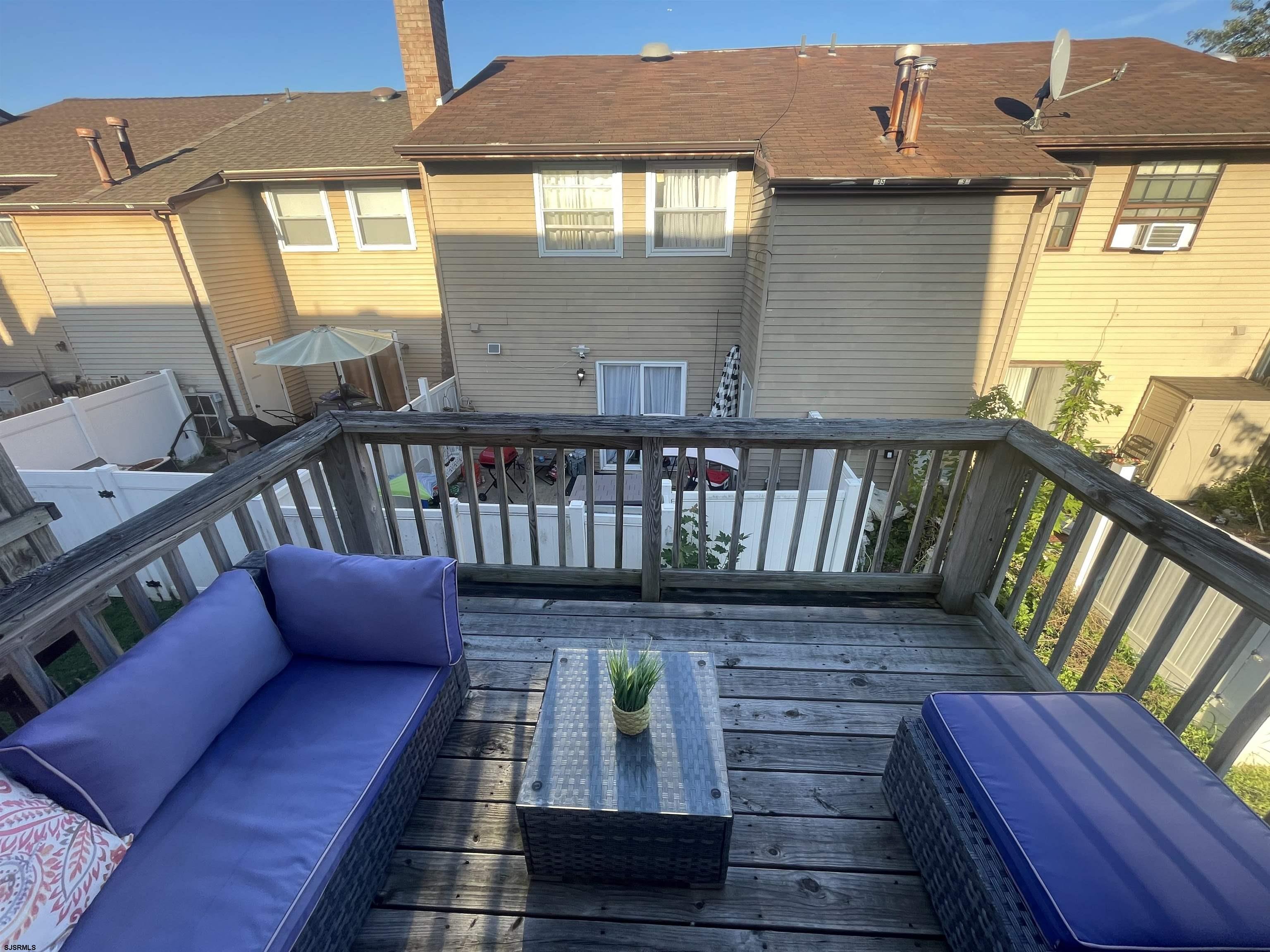 171 Via Cascata Drive, Unit B Clementon, NJ 08021 - Photo 4 of 7 a view of a balcony with furniture