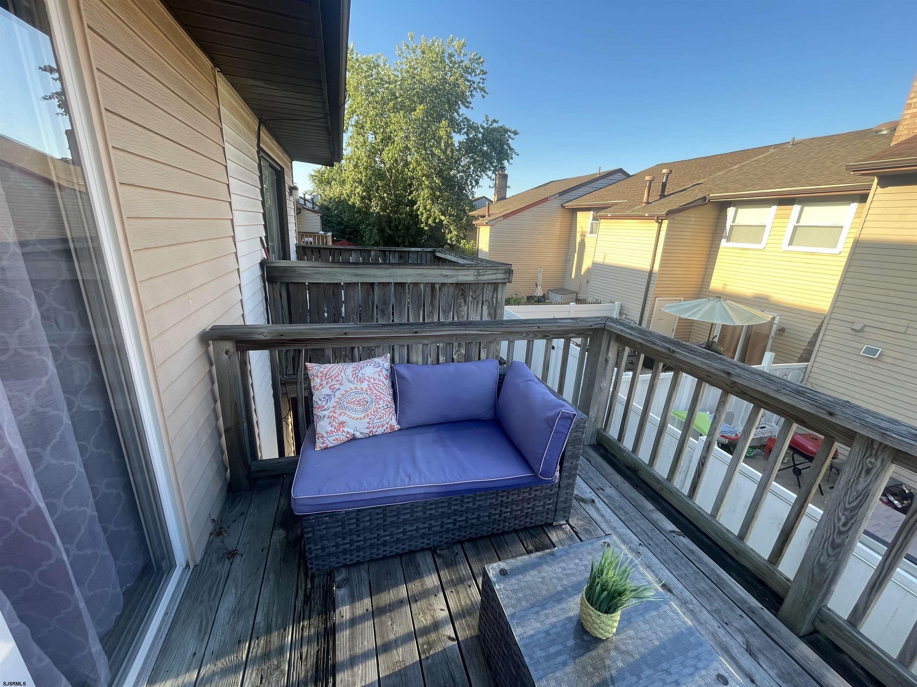 171 Via Cascata Drive, Unit B Clementon, NJ 08021 - Photo 6 of 7 a view of a balcony with furniture