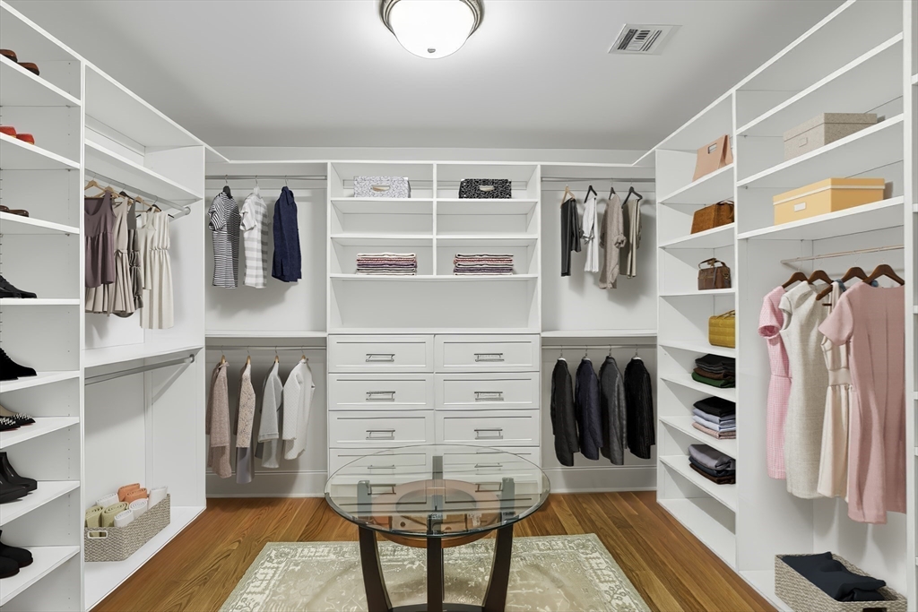 2 Whisper Way Hopkinton, MA 01748 - Photo 31 of 42 a view of walk in closet with clothes and shoes
