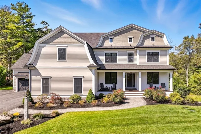 a spacious bedroom with a bed and a window