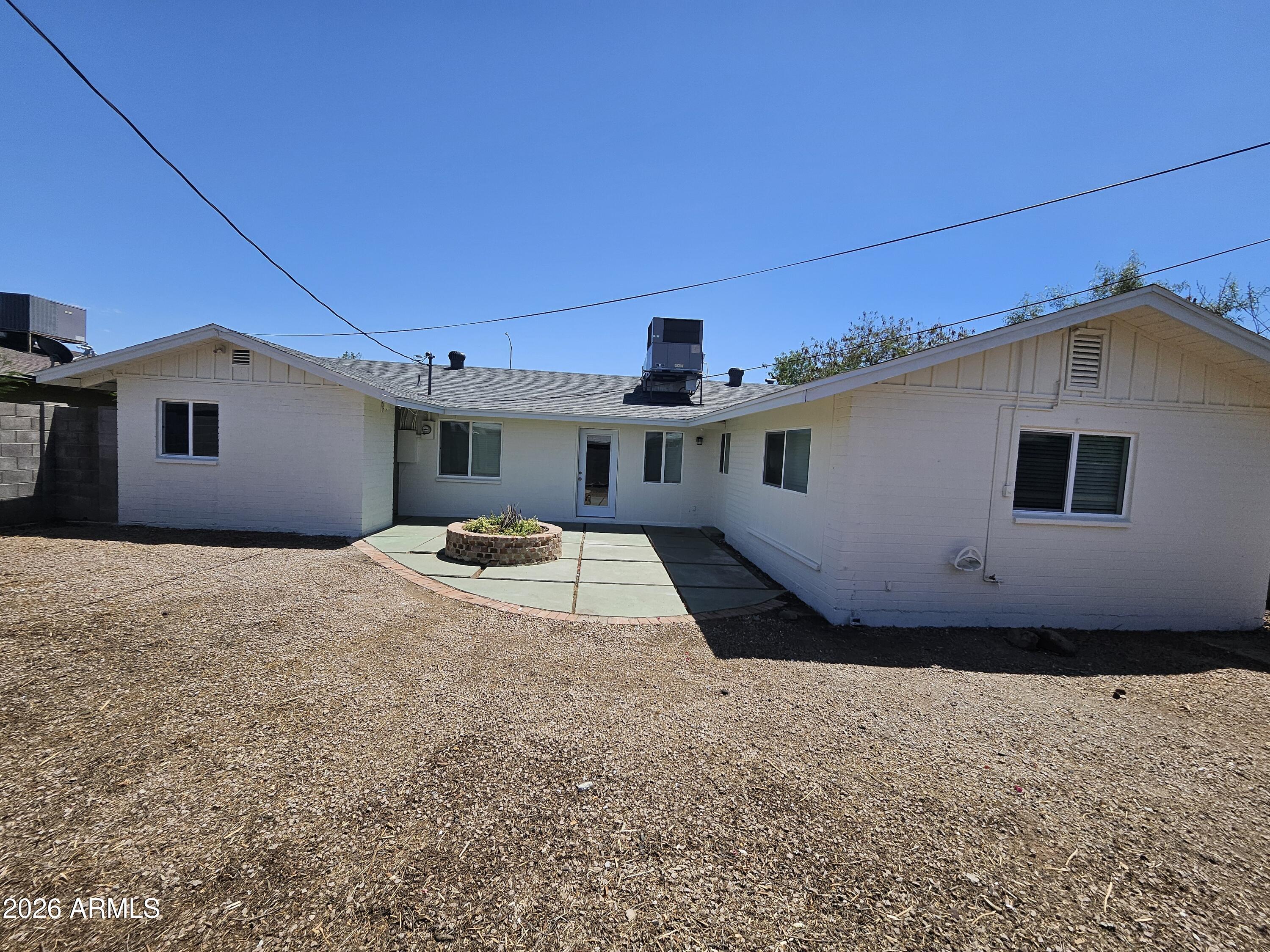 524 West 3rd Place Mesa, AZ 85201 - Photo 20 of 23 a front view of a house with windows