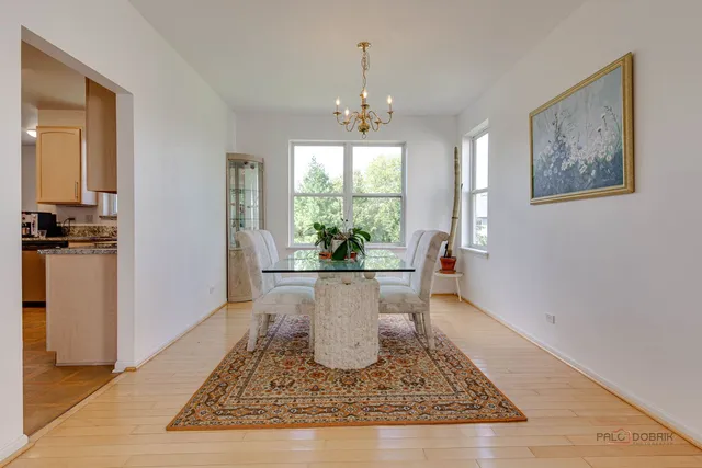 a view of a living room and dining room