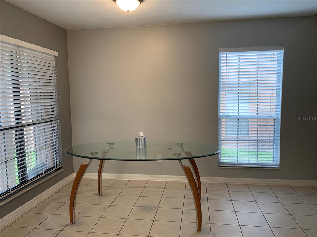 5754 Southwest 8th Place Gainesville, FL 32607 - Photo 7 of 29 a view of an empty room with a window
