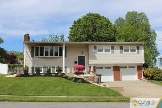 65 Wilk Road Edison, NJ 08837 - Photo 1 of 17 a house view with a garden space