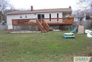 65 Wilk Road Edison, NJ 08837 - Photo 3 of 17 a front view of a house with a yard