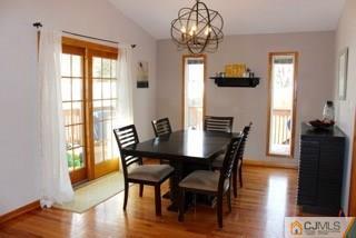 65 Wilk Road Edison, NJ 08837 - Photo 6 of 17 a view of a dining room with furniture window and wooden floor