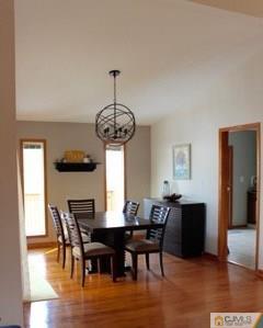 65 Wilk Road Edison, NJ 08837 - Photo 7 of 17 a view of a dining room with furniture wooden floor and chandelier