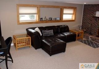 65 Wilk Road Edison, NJ 08837 - Photo 10 of 17 a living room with furniture and a window